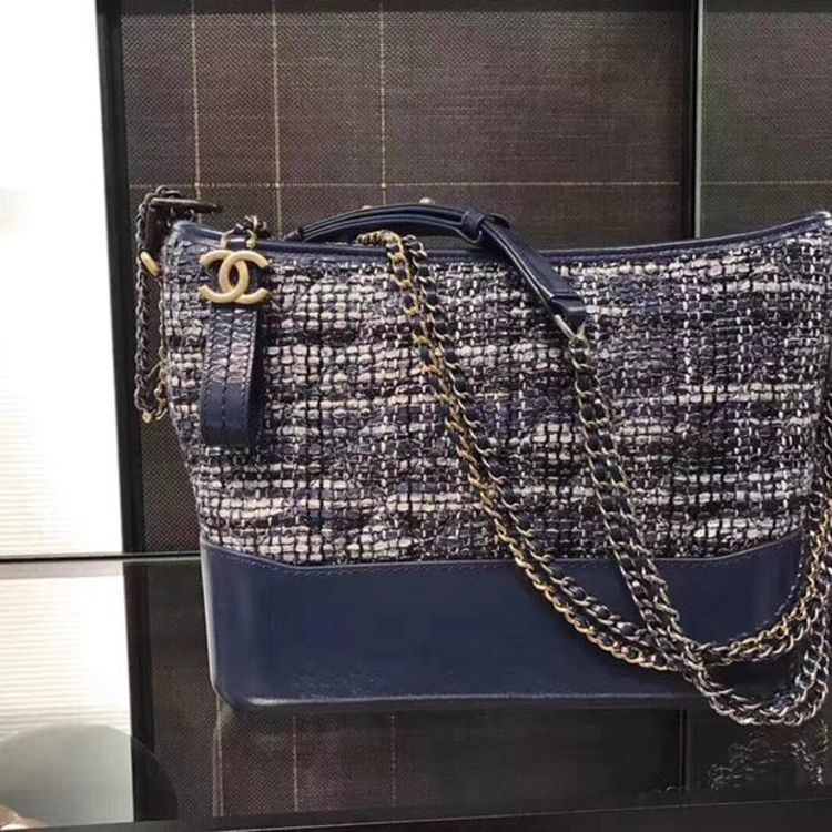 chanel 香奈儿编织流浪包中号