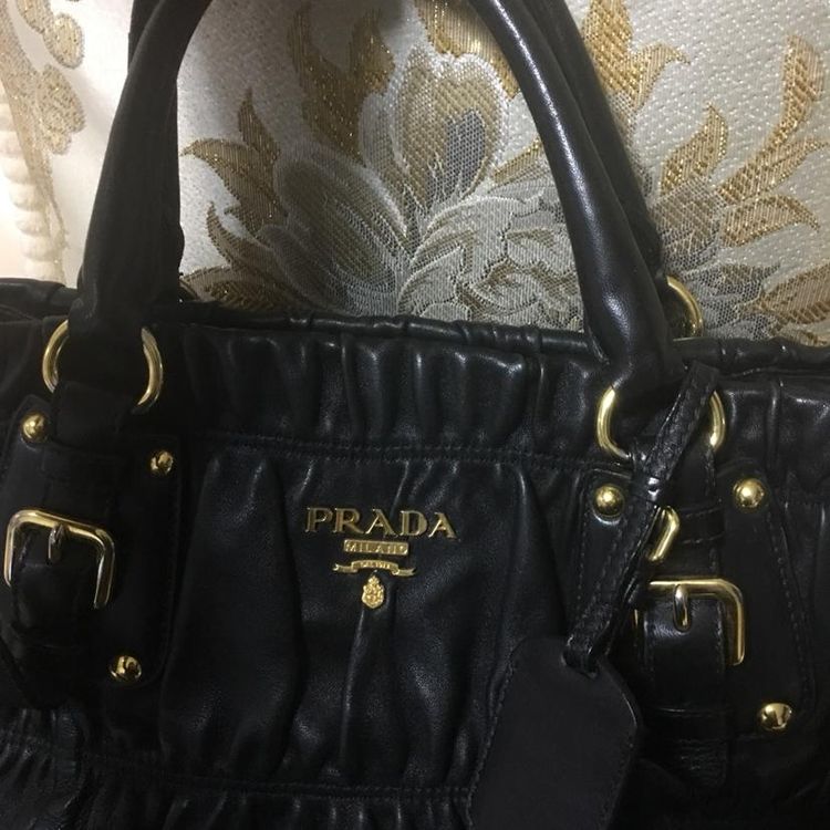 prada 普拉达经典小羊皮全皮褶皱单肩包