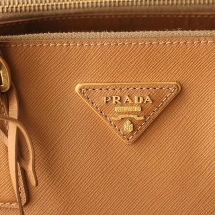 prada 普拉达金棕色十字纹牛皮杀手包